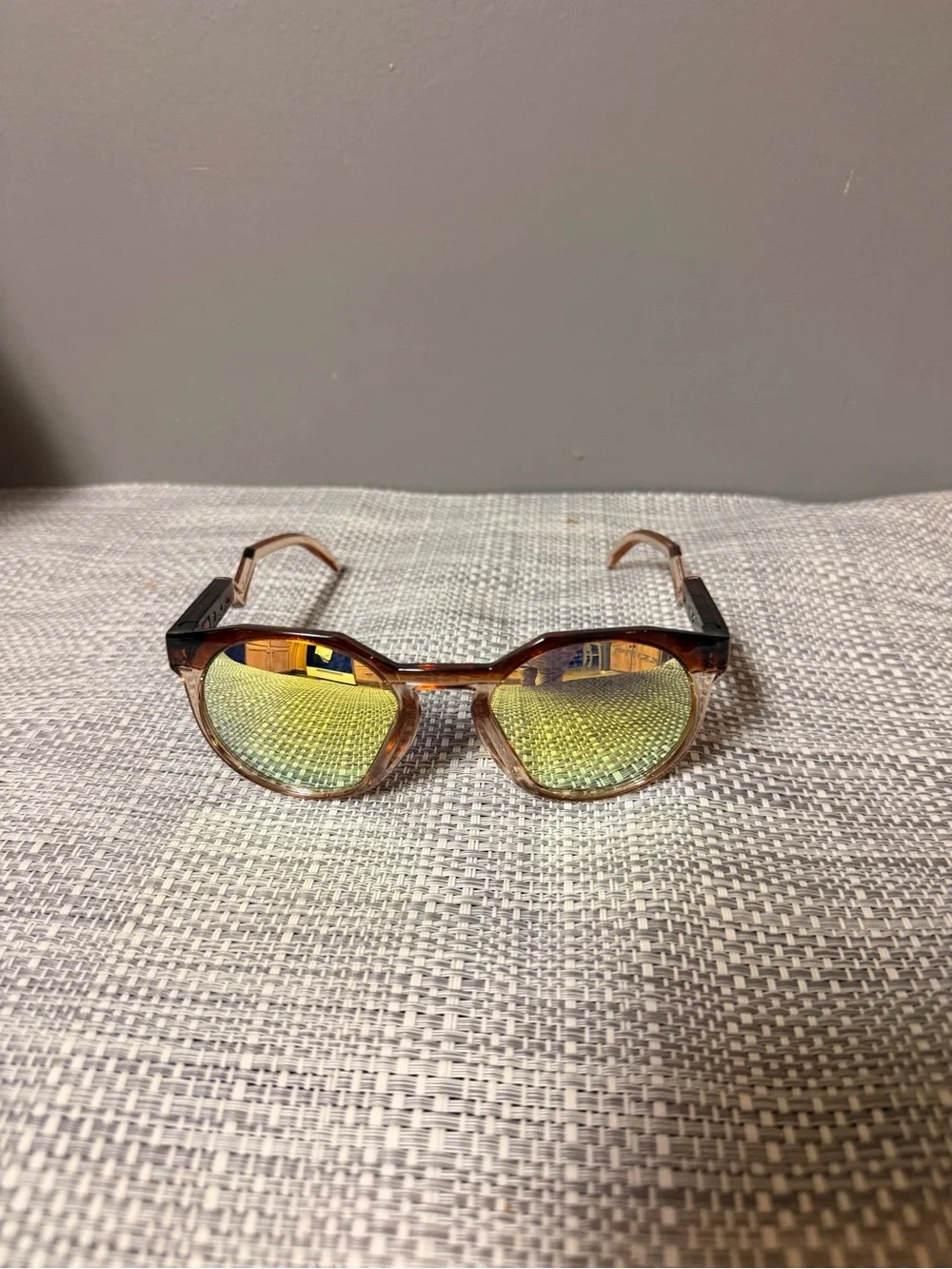 Oakley Tortoiseshell Frame Sunglasses with Blue Lenses